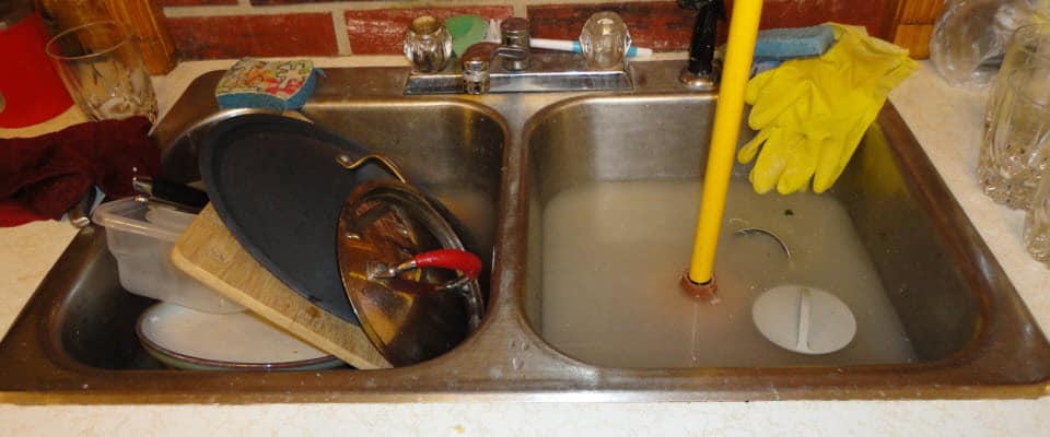 drain cleaning | clogged sink | drain clog | stopped up drain |clean drain | clogged sewer