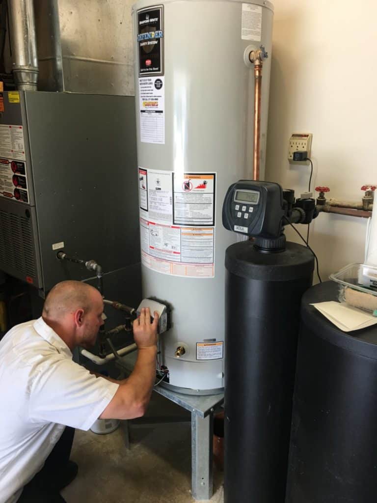 Replace two water heaters with one? The tank on the right is done